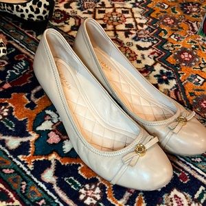 Beige Cole haan wedges.